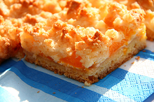 Mandarinen-Schmandkuchen mit Kokosstreuseln